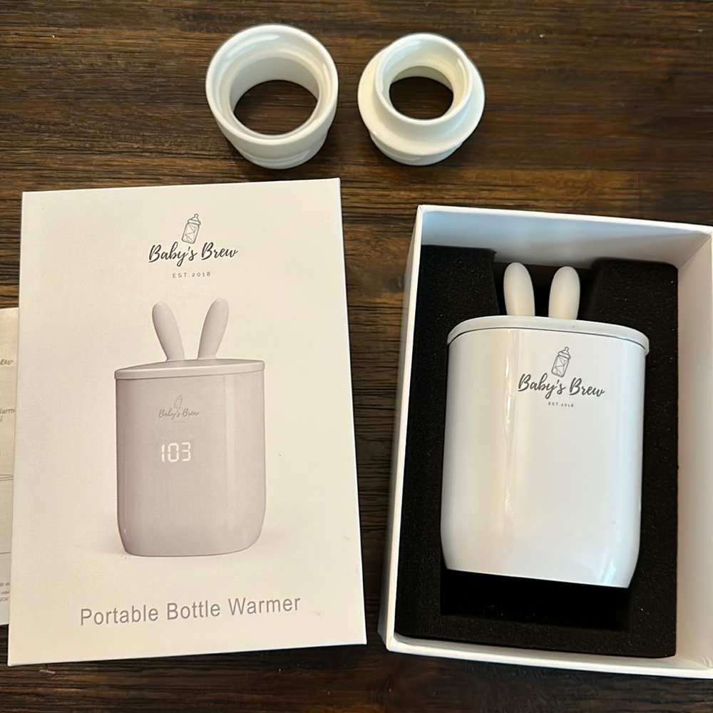 Baby’s brew portable bottle warmer! Comes with 2 attachments!